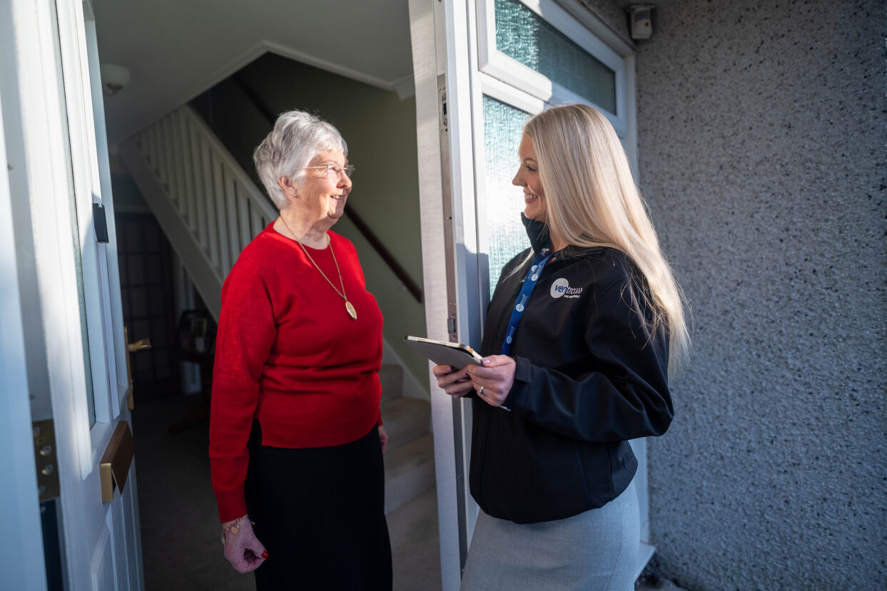 Ventro Staff discussing works with elderly resident