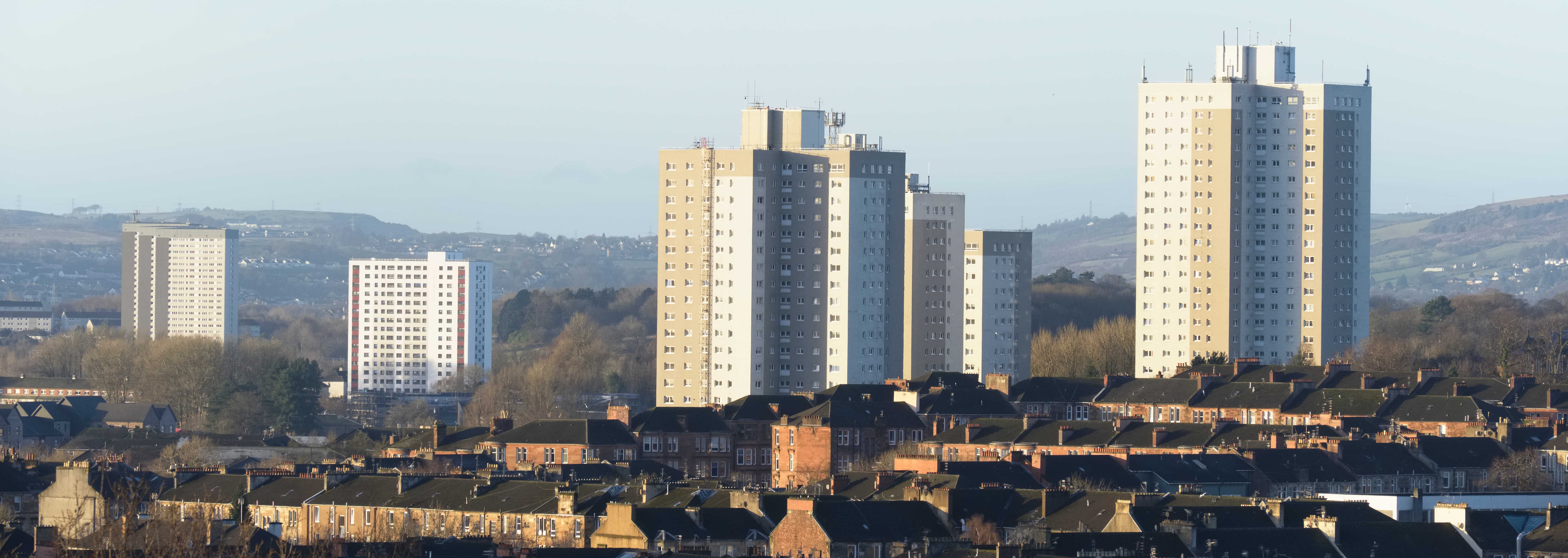 Image of high rise residential blocks surrounded by houses.